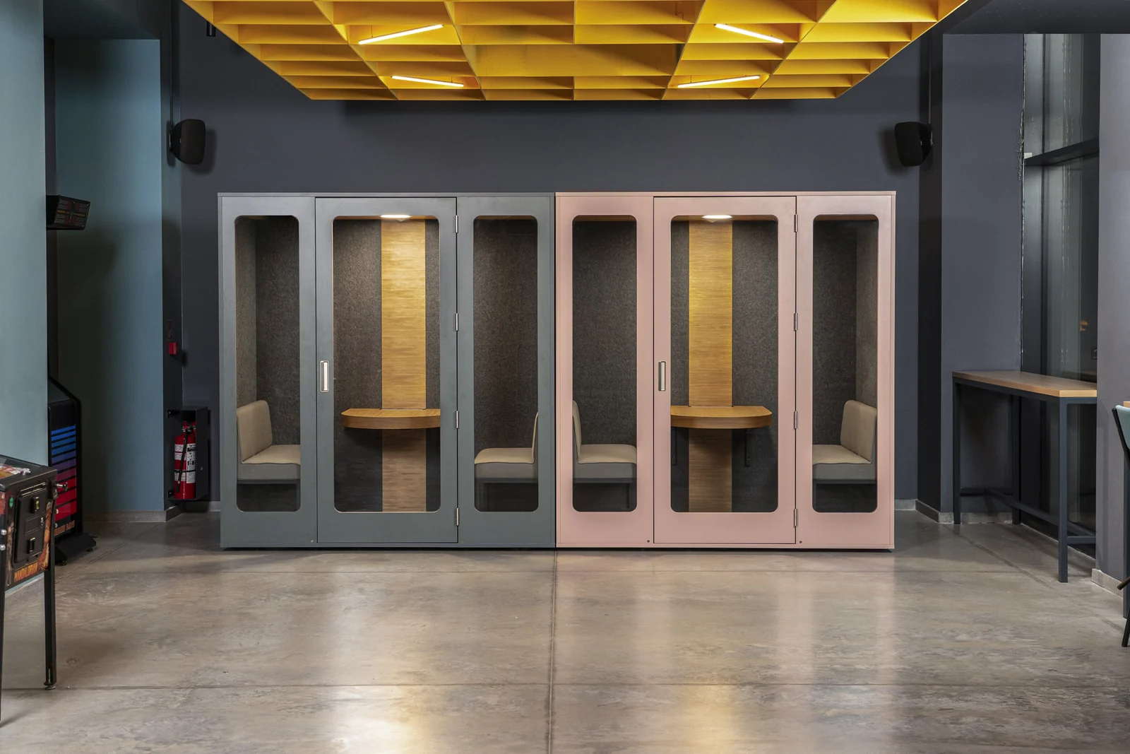 Grey-green and pink MEAVO Camden meeting pods side by side